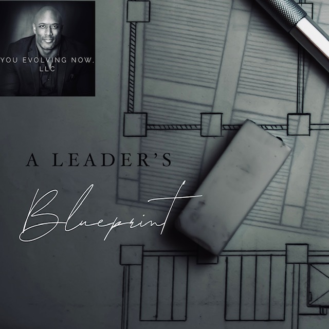 a leaders blueprint, eraser sitting on top of a building bluprint